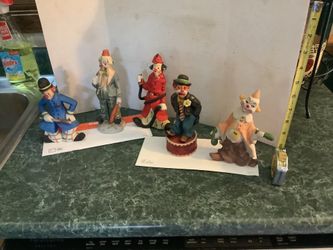 Vintage set of Mann ceramic clowns including Bobby the Police Officer, Seymour the fireman, Chalkware clown, Bat Hand clown, I think Pucci clown
