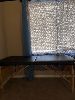 Portable folding massage/esthetic bed