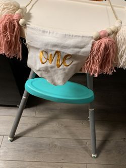 One high chair birthday banner