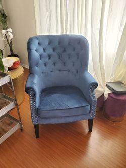 Velvet tufted chair