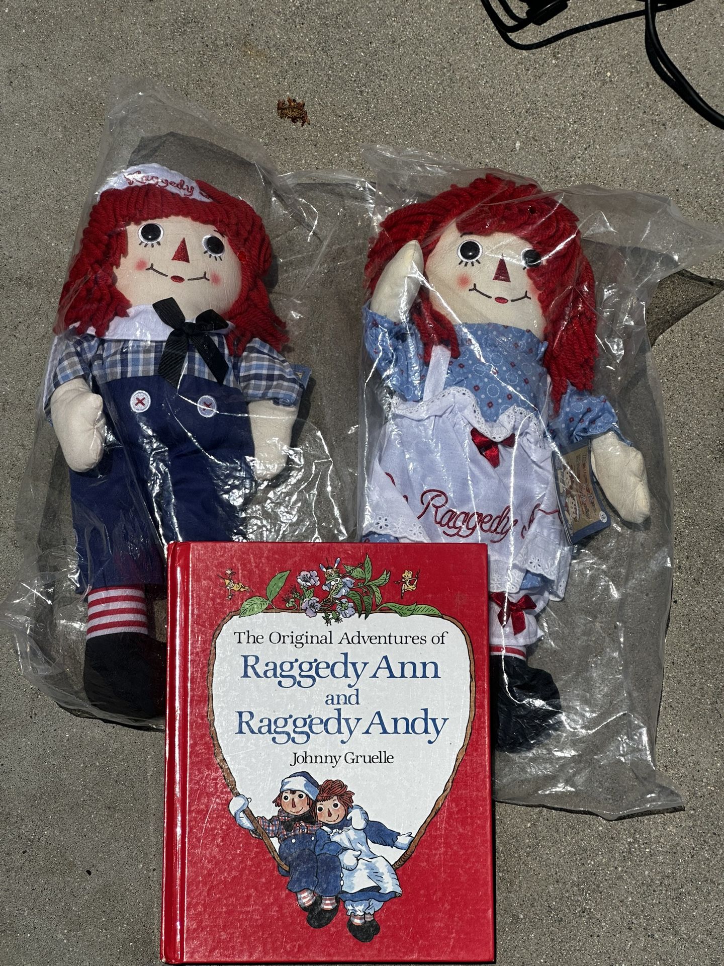 Raggedy Ann and Raggedy Andy Dolls And Book