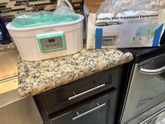Paraffin Wax Treatment Equipment used for heat therapy and moisturizing spa treatments on hands, feet, and elbows new in box never used asking 50