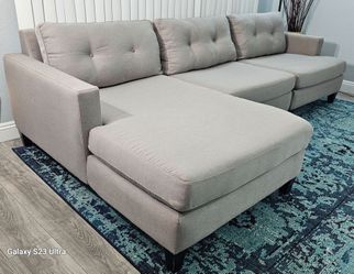 Excellent condition, like new. Gray sectional sofa, 3 pieces, join together with hooks, removable double-sided covers, pet and smoke free, delivery av