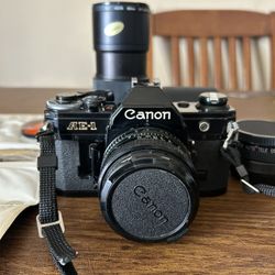 Canon AE 1 SLR Black Body camera W/ Accessories