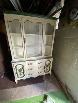Antique glass China cabinet by Bernhardt furniture company