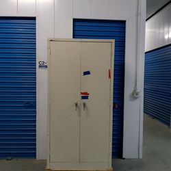 2 door metal storage cabinet $ 250