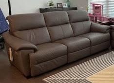 New - Natuzzi leather couch w/ power recliner  **best offer, not free**
