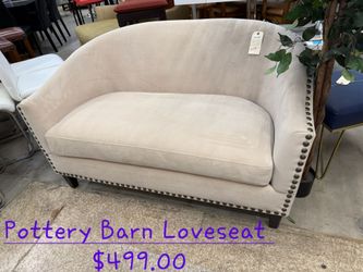 Loveseat Pottery Barn w/ NailheadsWe are located at 2811 East Bell road. Another Time Around Furniture.