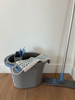 Bucket and cleaning broom