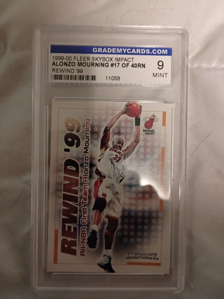 99 - 00 Fleer Skybox Impact. Graded Card Alonzo  Morning 