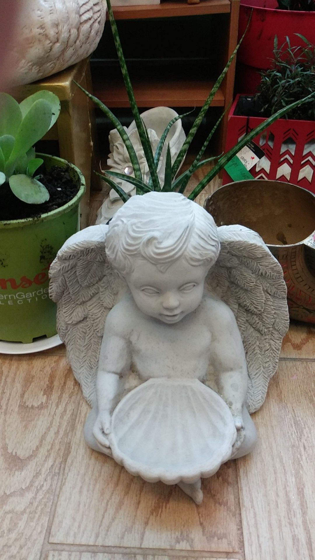 Small Vintage Sitting Cherub bird bath.