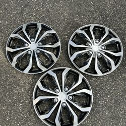 (3) 16” Aftermarket Hubcaps 