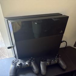 PS4 w/ games & controllers
