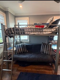 Full over Full bunk set with bottom futon/ couch.