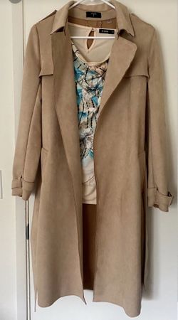 Coat Tahiri.