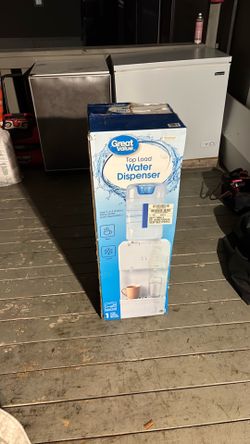 Water dispenser , brand new and sealed