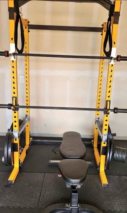 Powertec bench and power cage((( no bar no weights included ))) it does include dip bars safety bars and jhooks