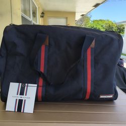 duffel navy blue with red and white striped accents. 