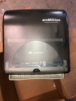 Touchless towel dispenser