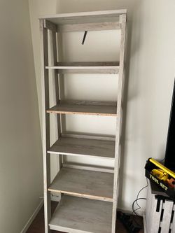 Distressed white bookshelf