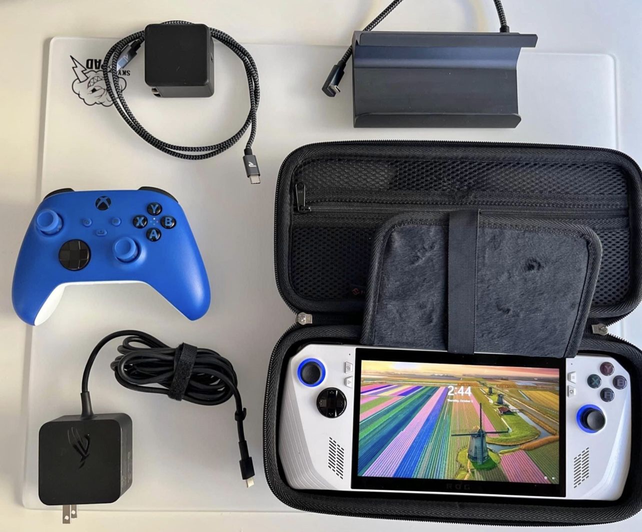 ASUS ROG Ally RZ1 Extreme gaming handheld with accessories