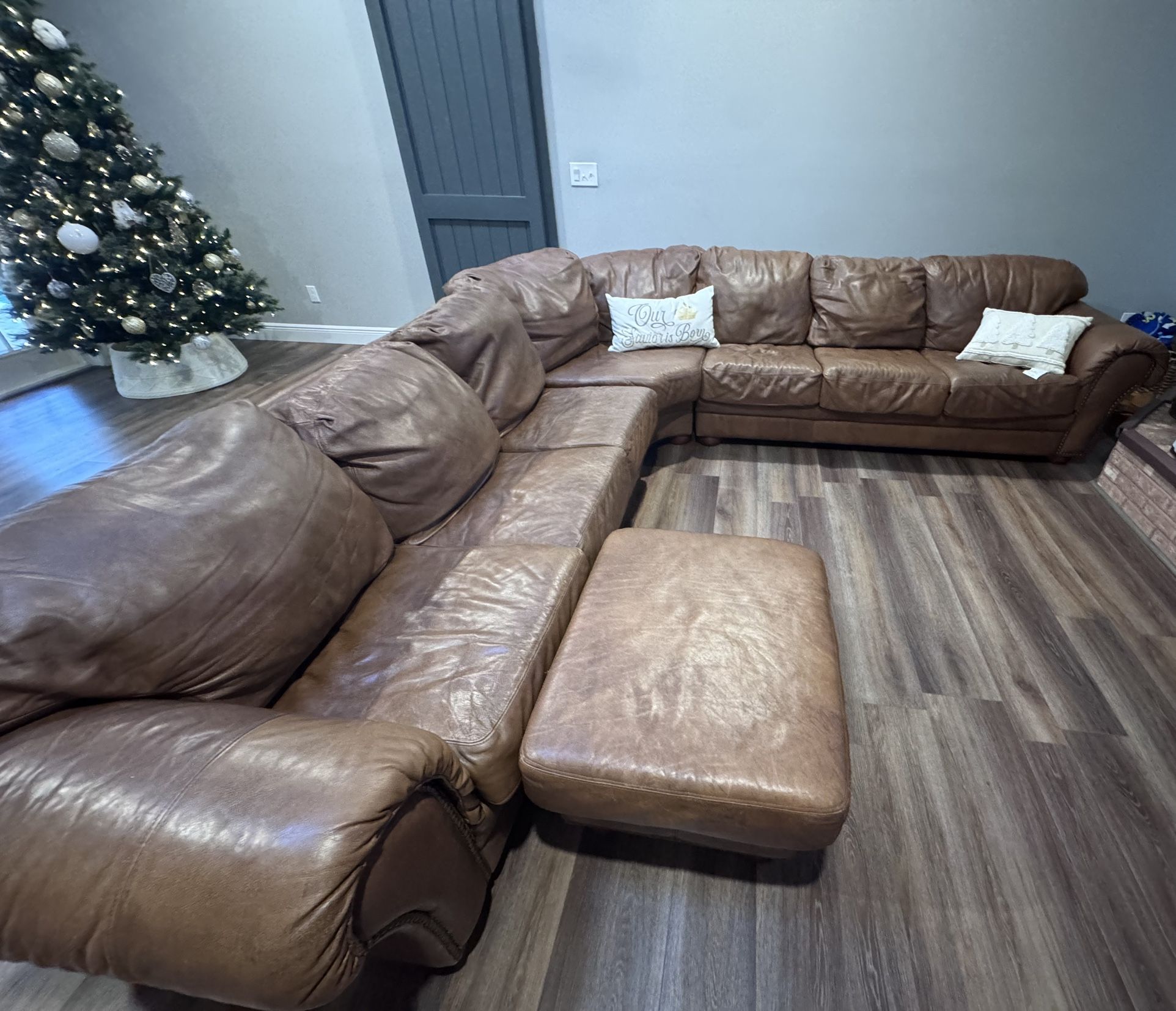 Designer, leather sectional sofa, couch good condition