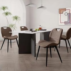 Brand new un-assembled set of 4 Leather dining chairs (not table ) Extremely Good Quality Chairs