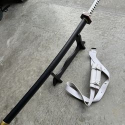 Metal Katana Sword in great shape, with stand and Sheath!  