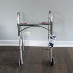 Deluxe Two Button Folding Walker,

Adult With 5" Wheels