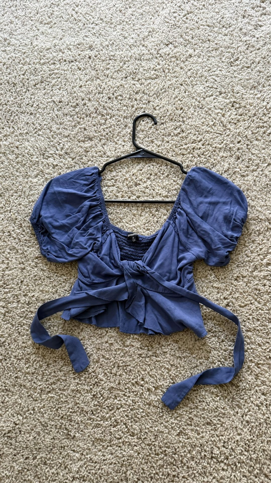 women bundles of clothes