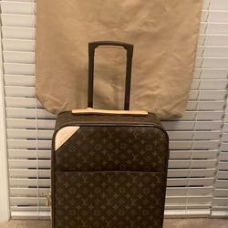 Louis Vuitton Monogram Pegase 55 travel suitcase