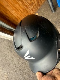 Easton batting helmet, youth size with jaw guard, and three bats