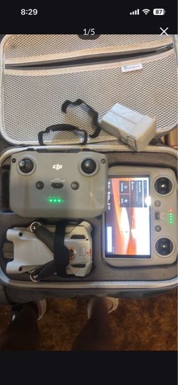 Dji mini three pro drone of RC control, controller and regular control controller included type C charger and bag two of them
