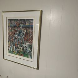 This is a limited edition 133/1500 lithograph print by artist Sanford Holien of Seattle Seahawks player Steve Largent. 