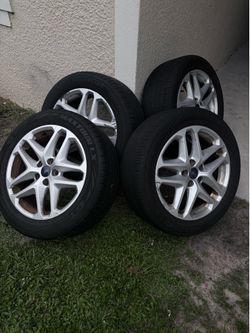 Ford fusion 5x108 rims with tires 235/50/R17