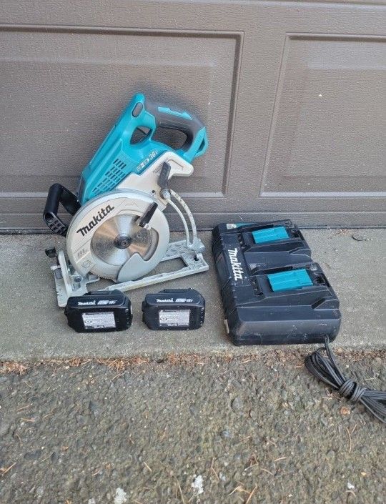 MAKITA 18V BRUSHLESS CIRCULAR SAW WITH 2 18V 2.0AH BATTERYS AND DUAL CHARGER PERFECT CONDITION