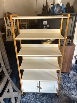 Gold shelf with wheels