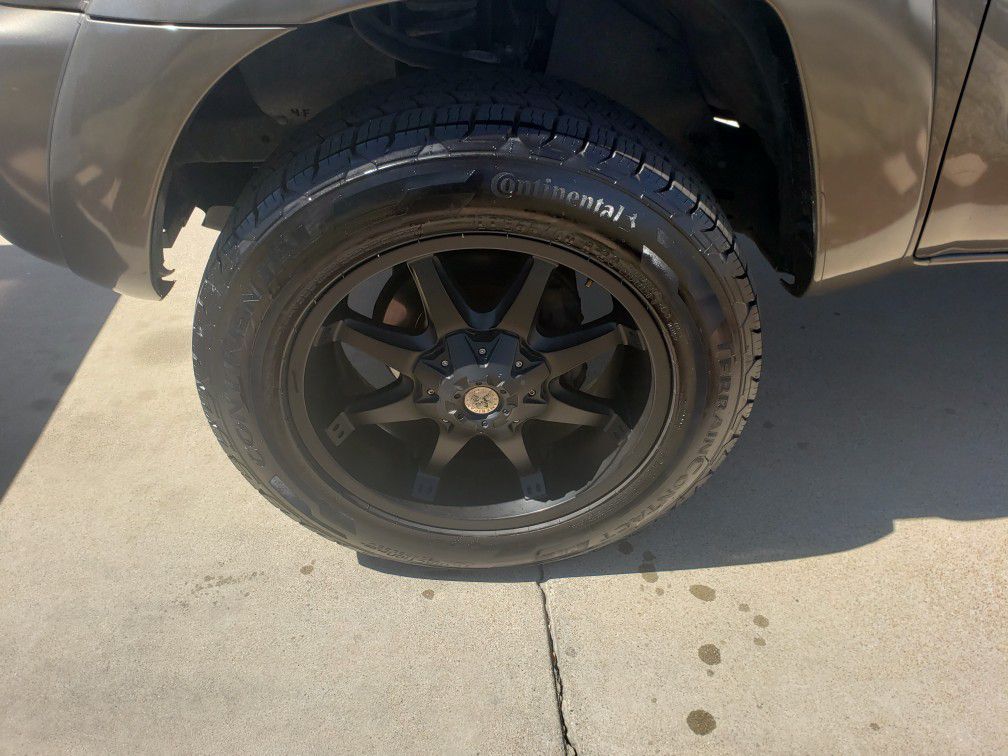 looking to trade  20" rims and tires toyota or chevy 6 lug pattern tires practically new.