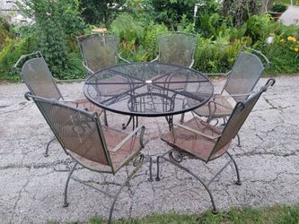 Set of 6 spring back chairs and 48" table