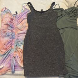 Bag With Dresses And Other Clothes