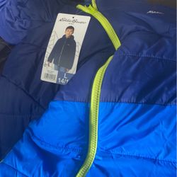 Brand new coat size  L 14/16 Eddie Bauer reversible jacket