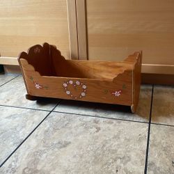 Wooden baby doll bed