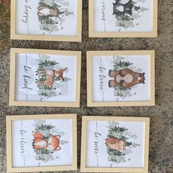 Light wood frames measuring 8x10, featuring animal prints, ideal for a nursery or baby room