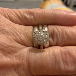 1 Kt White Gold Diamond Engagement Ring With 2, 14 Kt White Gold Bands On Each Side.