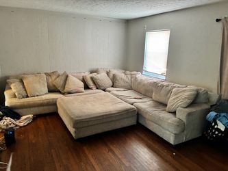Large Beige Sectional Sofa with Ottoman