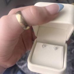 14 karat natural gold pierced friction. round brilliant cut natural mined diamonds.