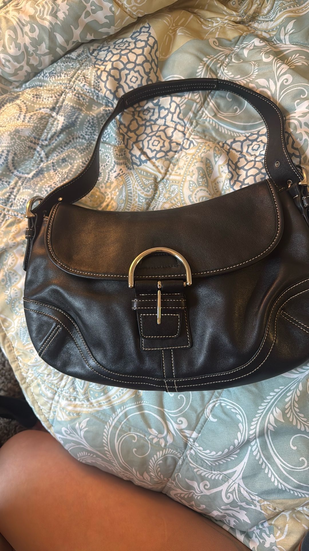 Elegant, classic and beautifully made coach Soho bag