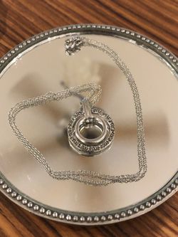 Sterling Silver Circle pendant with diamond shards