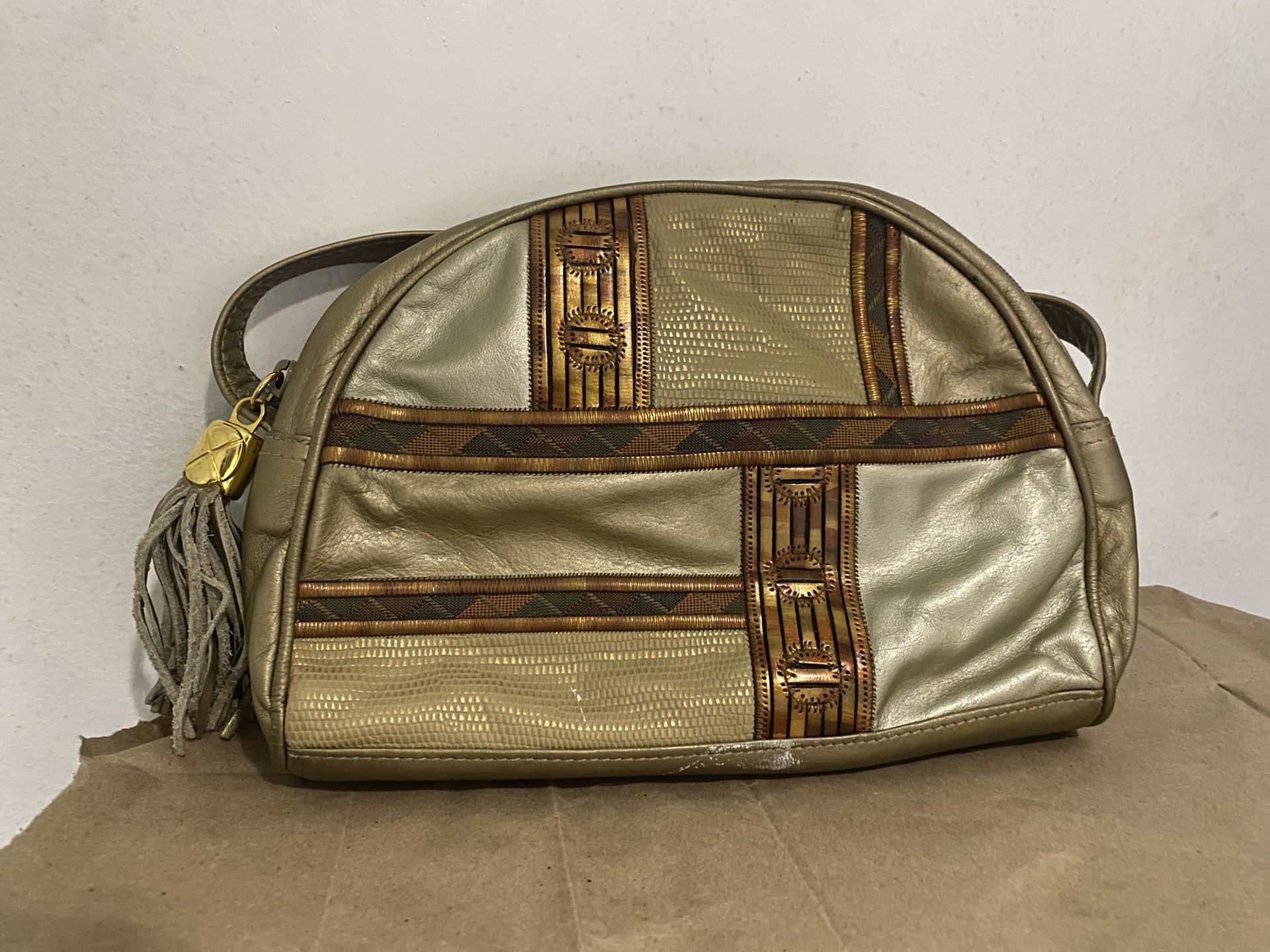 VTG Pantera baguette purse in gold and brown tassels and strap