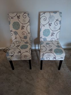 2 Chairs in Great Condition.  White & Blue Floral Design.